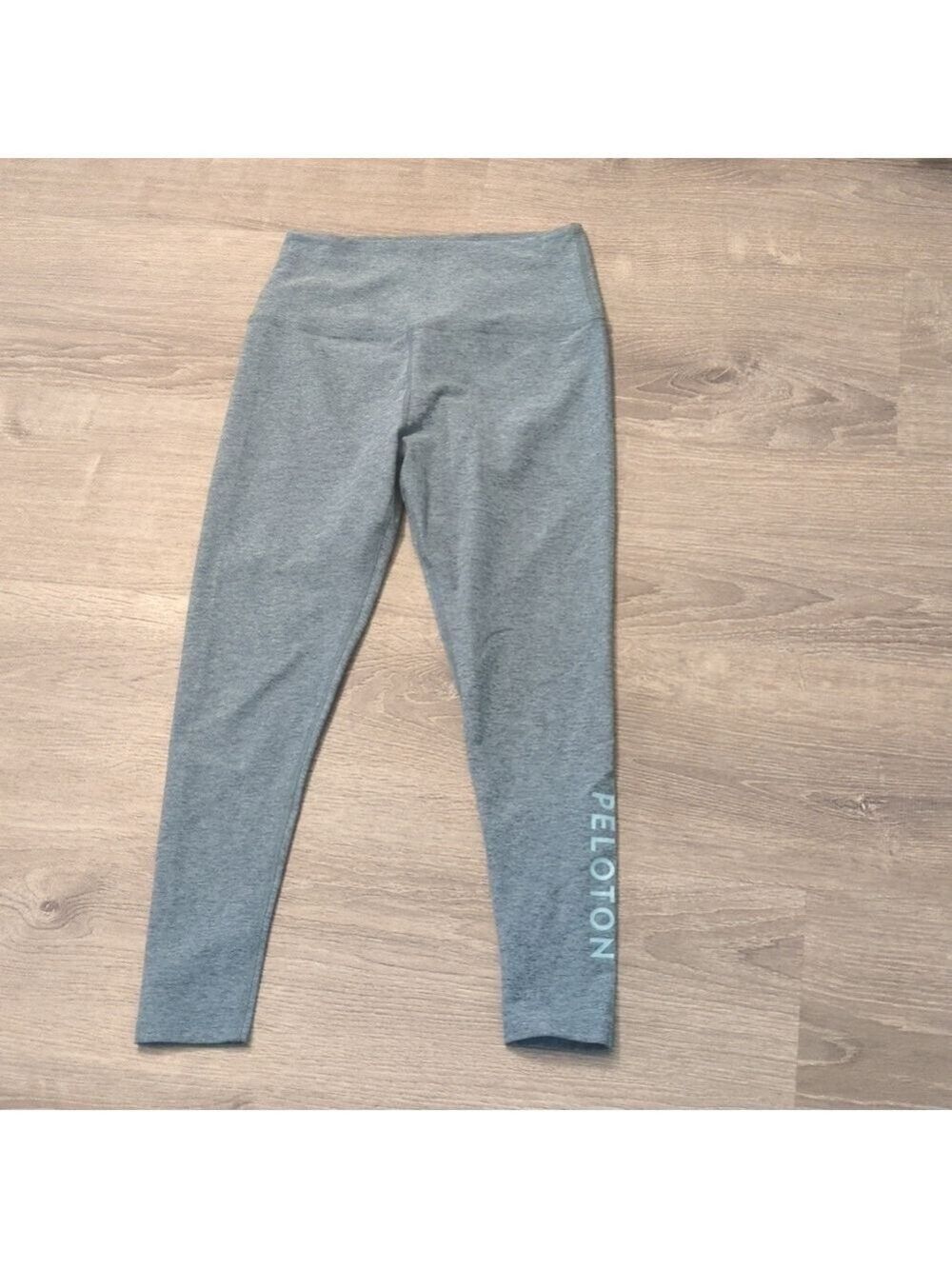 Beyond yoga x peloton colab caught in the midi leggings size large